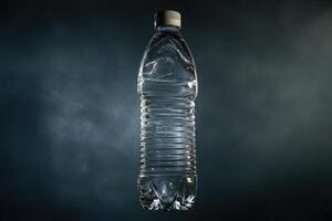 A Single Plastic Water Bottle Against a Dark Blue Background photo