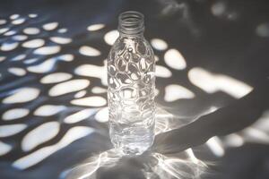 A Clear Plastic Water Bottle with Light Patterns photo