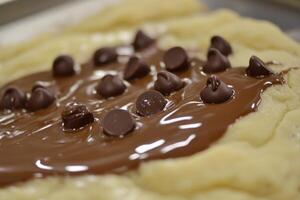 Melted Chocolate Drizzled Over Cookie Dough photo