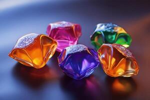 Colorful Shiny Gems Glistening On Dark Surface photo