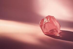 Pink Crystal Resting On A Soft Pink Surface photo