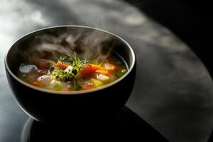 Steaming Bowl Of Delicious Vegetable Soup photo