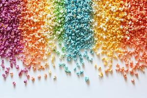 Rainbow Colored Popcorn Arranged In A Gradient Pattern photo