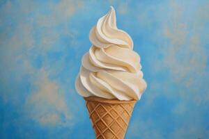 Creamy Vanilla Ice Cream Cone Against Blue Sky photo