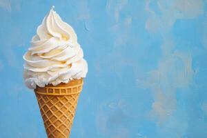 Creamy Vanilla Ice Cream Cone Against Blue Background photo