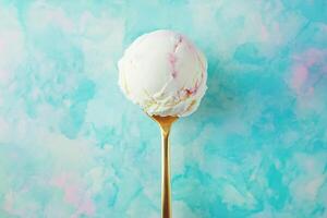 A Single Scoop Of Strawberry Ice Cream On A Gold Spoon photo