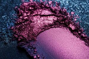 Closeup view of vibrant purple and blue glitter eyeshadow photo