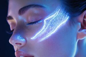 Closeup of a womans face with glowing blue art photo