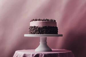 Delicious Chocolate And Pink Cake On Display Stand photo