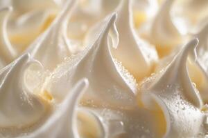 Closeup of creamy textured swirls of meringue photo