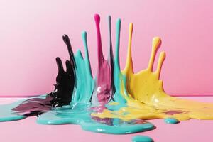 Colorful Paint Splashes on Pink Background photo