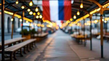 Blurred image of a market street with flags. photo