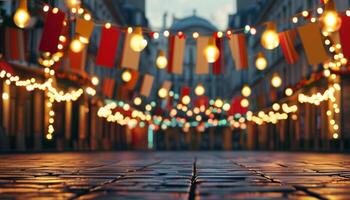 Cobblestone street at night with festive lights photo