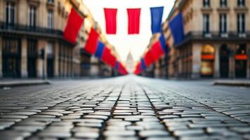 Cobblestone street in Paris with French flags photo