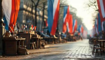 Cobblestone street decorated with flags photo