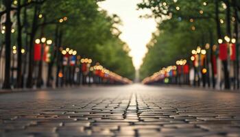 Cobblestone street lined with trees and lights photo