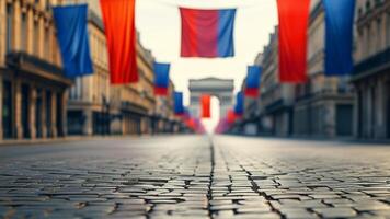 Cobblestone street with French flags and Arc de Triomphe in background photo