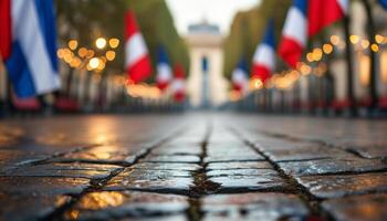 Cobblestone street with French flags photo