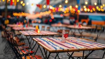 Cozy bistro tables on a city street at dusk. photo