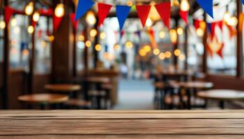 Empty wooden table in a festive outdoor cafe. photo