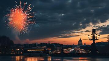 Fireworks over cityscape at sunset photo