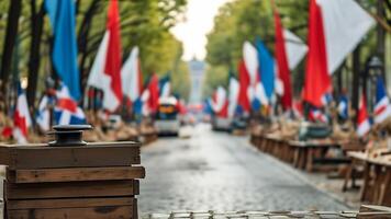 French flags line a cobblestone street. photo