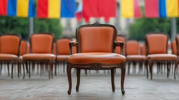 Single orange chair in a row, leadership, meeting, decision photo
