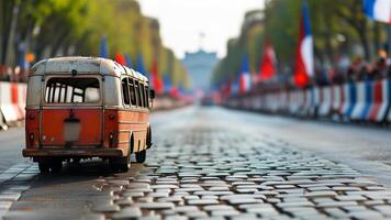 Vintage bus model on cobblestone street photo