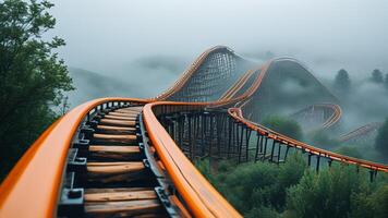Rollercoaster in fog, misty mountain landscape photo