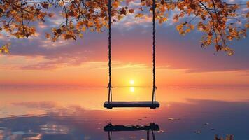 Sunset over calm lake with swing photo