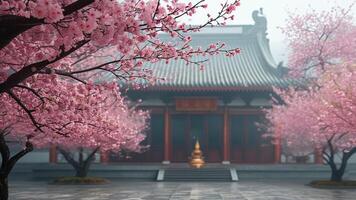 Misty cherry blossoms frame a Chinese temple. photo