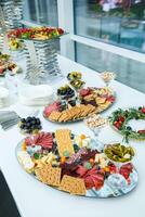 Delicious dish on the buffet table. Cold appetizers from the chef for the celebration photo