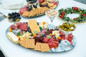 Delicious dish on the buffet table. Cold appetizers from the chef for the celebration photo