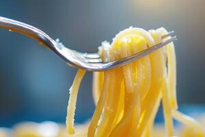 Savory Spaghetti Noodles Served with a Fork, Perfect for a Comforting Meal photo