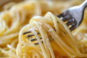 Savory Spaghetti Noodles Served with a Fork, Perfect for a Comforting Meal photo