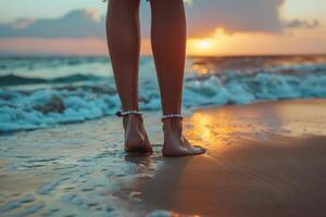 Stylish Young Woman with Anklet Relaxing Near the Ocean photo
