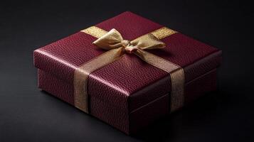 Red Gift Box with Gold Bow and Ribbon photo