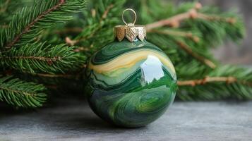 Green Marble Christmas Ornament with Pine Branches photo