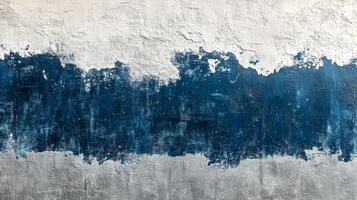 Weathered Concrete Wall with Blue and Gray Paint photo