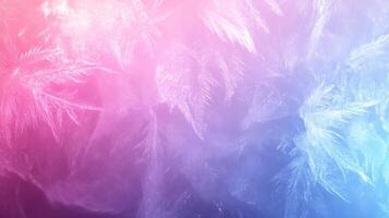 Abstract Frost Patterns on a Frosted Window with a Pink and Blue Gradient Background photo
