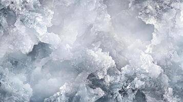 Abstract Texture of Frosted Ice with Irregular Shapes and Crystalline Details photo