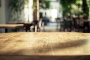 A table in a restaurant with a wooden top photo