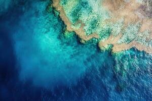 Aerial view of vibrant coral reefs in clear blue water. photo
