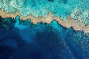 Aerial view of a vibrant coral reef and ocean. photo