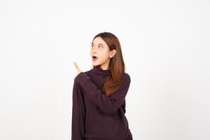 Wow Face Reaction, Presenting and Pointing aside copy space for advertising showing product Of Beautiful Asian Woman Isolated On White Background photo