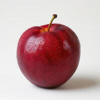 A ripe red apple with polka dots, symbolizing healthy and delicious. photo