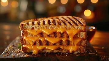 A grilled cheese sandwich with melted cheese on top photo