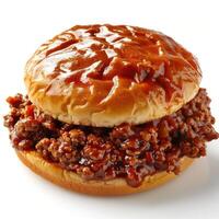 A close-up shot of a barbecue pulled pork sandwich topped with sausage on bun. photo