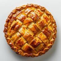 A golden brown pastry pie with a lattice top and a glaze on top. The crust is flaky, photo