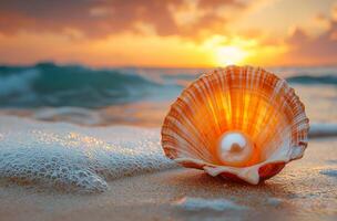 A pearl is sitting on the sand at the beach. The sun is setting in the background, creating a warm and peaceful atmosphere photo